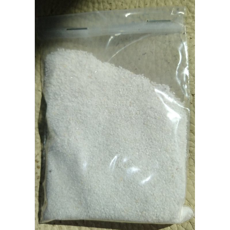 zakje wit grof zand 100gr.